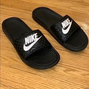 Nike slides.